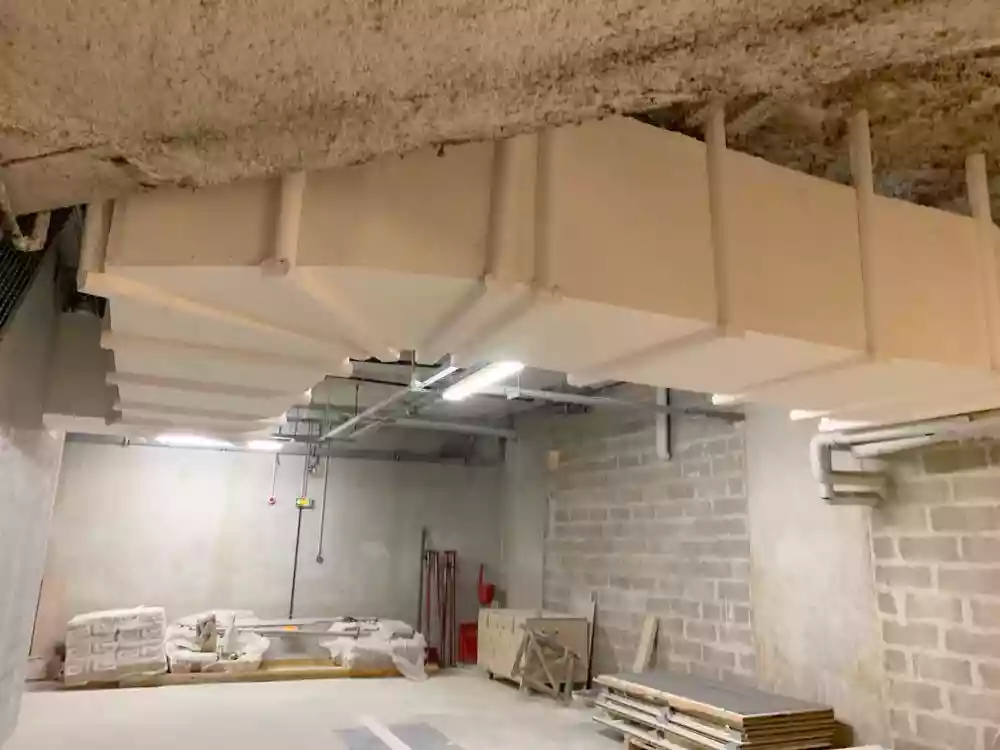 Coude de gaine coupe-feu recouvert en staff — Auditorium de Clamart