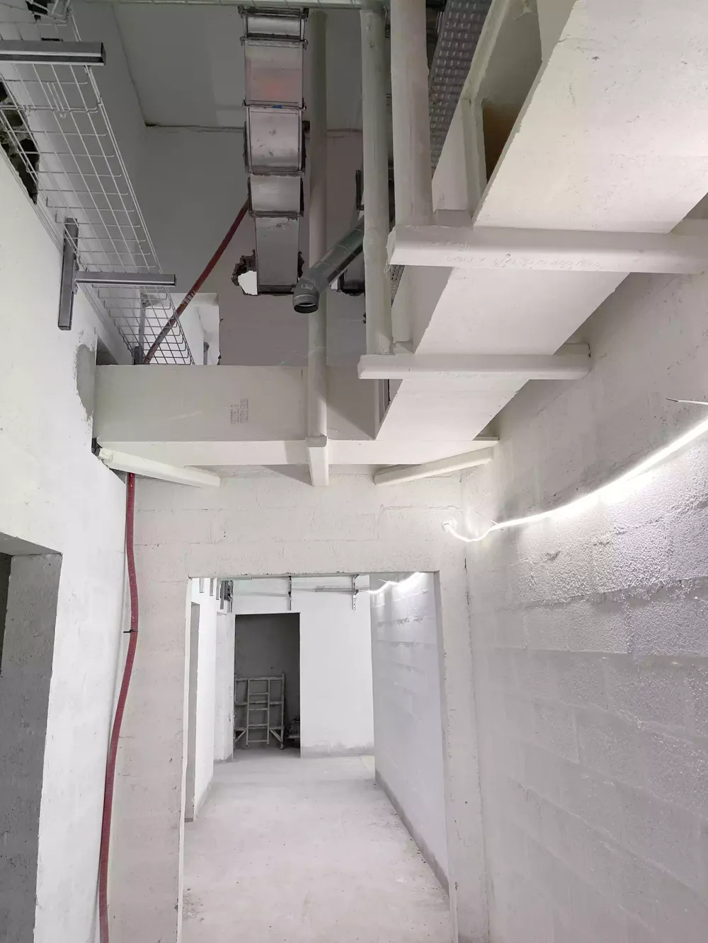 Gaine staff coupe-feu installée dans un couloir — Pleyel Saint-Denis